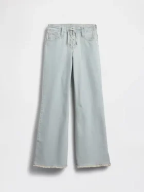 Jeans a vita bassa con chiusura allacciata e taglio svasato morbido per bambini