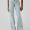 Jeans a vita bassa con chiusura allacciata e taglio svasato morbido per bambini