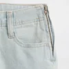 Jeans a vita bassa con chiusura allacciata e taglio svasato morbido per bambini