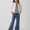 Jeans a vita bassa con cuciture e taglio svasato morbido per bambini