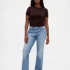 Jeans a vita bassa con tasche intrecciate, dal taglio lungo e slanciato