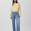 Jeans a vita bassa e dal taglio ampio in stile anni ’90