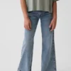 Jeans a vita bassa e gamba svasata per bambini