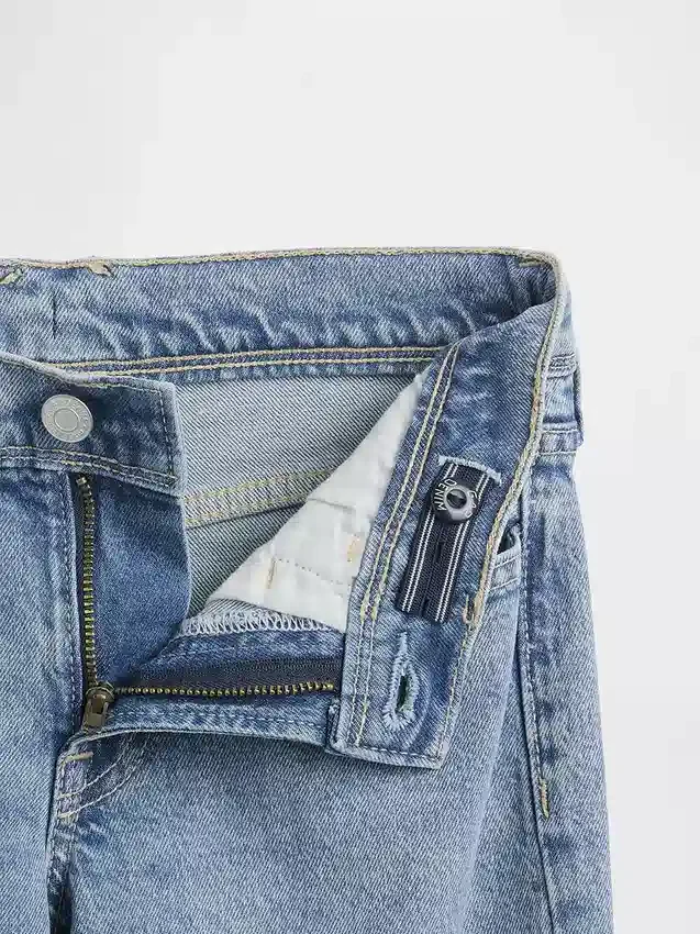 Jeans a vita bassa e gamba svasata per bambini