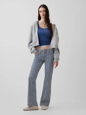 Jeans a vita bassa, lunghi e slim a righe