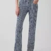 Jeans a vita bassa, lunghi e slim a righe