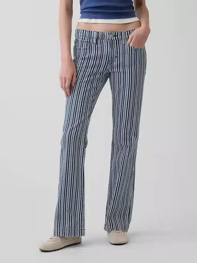 Jeans a vita bassa, lunghi e slim a righe