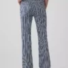Jeans a vita bassa, lunghi e slim a righe