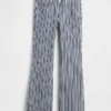 Jeans a vita bassa, lunghi e slim a righe