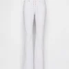 Jeans a vita bassa, lunghi e slim con lacci