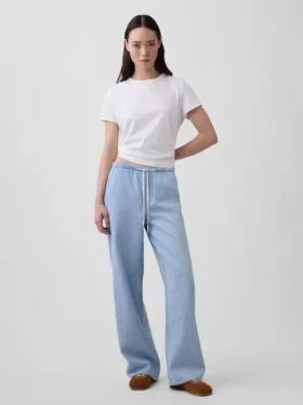 Jeans a vita bassa, morbidissimi, dal taglio ampio e a righe in stile anni ’90