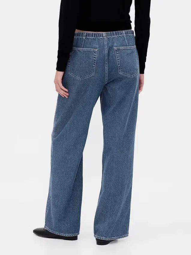 Jeans a vita bassa, morbidissimi, dal taglio ampio in stile anni ’90