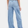 Jeans a vita bassa, morbidissimi, dal taglio ampio in stile anni ’90