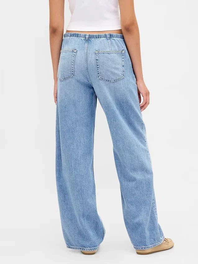 Jeans a vita bassa, morbidissimi, dal taglio ampio in stile anni ’90