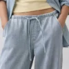 Jeans a vita bassa, morbidissimi, dal taglio ampio in stile anni ’90