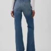 Jeans a vita bassa, rigidi, lunghi e dal taglio slim