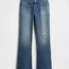 Jeans a vita bassa, rigidi, lunghi e dal taglio slim