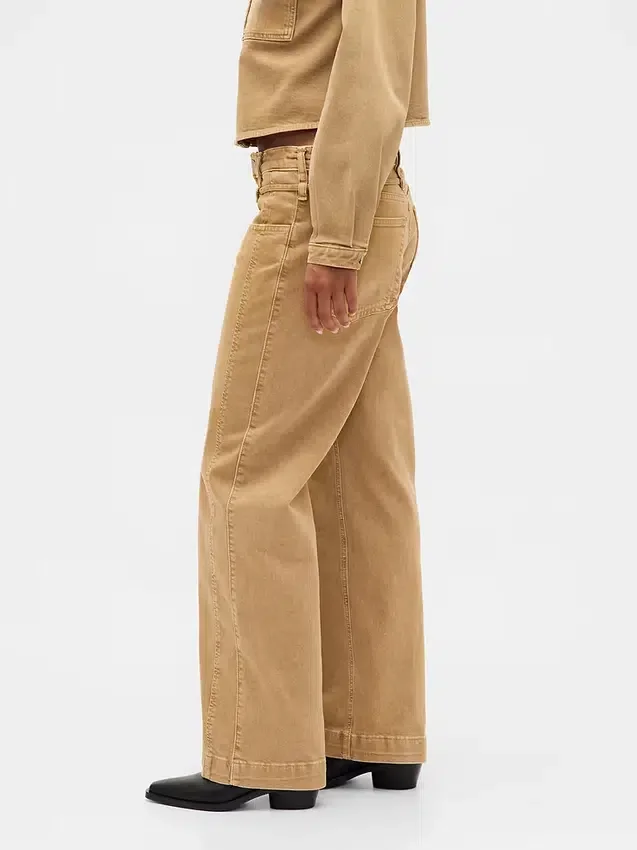 Jeans a vita bassa stile anni '90, larghi, con micro cintura