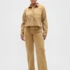 Jeans a vita bassa stile anni '90, larghi, con micro cintura