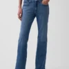 Jeans a vita media dal taglio rilassato con gamba a zampa
