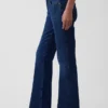 Jeans a vita media dal taglio rilassato con gamba a zampa