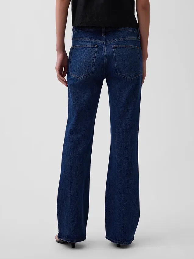 Jeans a vita media dal taglio rilassato con gamba a zampa
