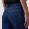 Jeans a vita media dal taglio rilassato con gamba a zampa