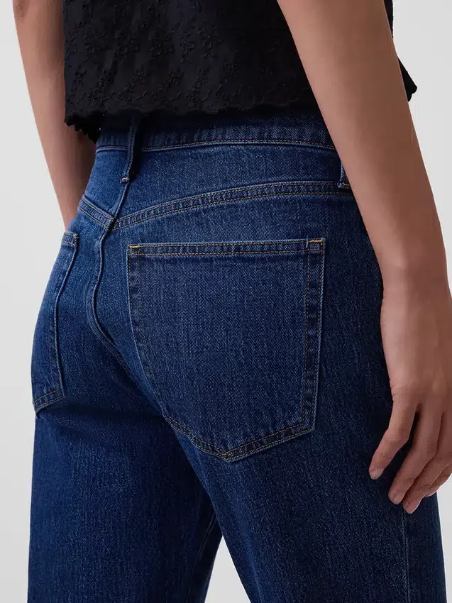 Jeans a vita media dal taglio rilassato con gamba a zampa