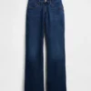 Jeans a vita media dal taglio rilassato con gamba a zampa