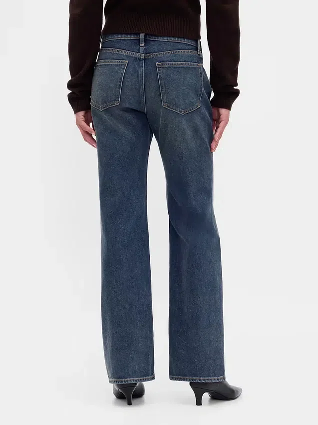 Jeans a vita media, rigidi, dal taglio rilassato e svasati