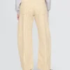 Jeans a zampa alta a righe color cachi