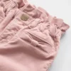 Jeans a zampa con fiocco in velluto per neonato & bebè