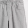 Jeans baggy a vita bassa con fiocco e orlo a spacco per bambini