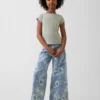 Jeans baggy a vita bassa con motivo floreale per bambini