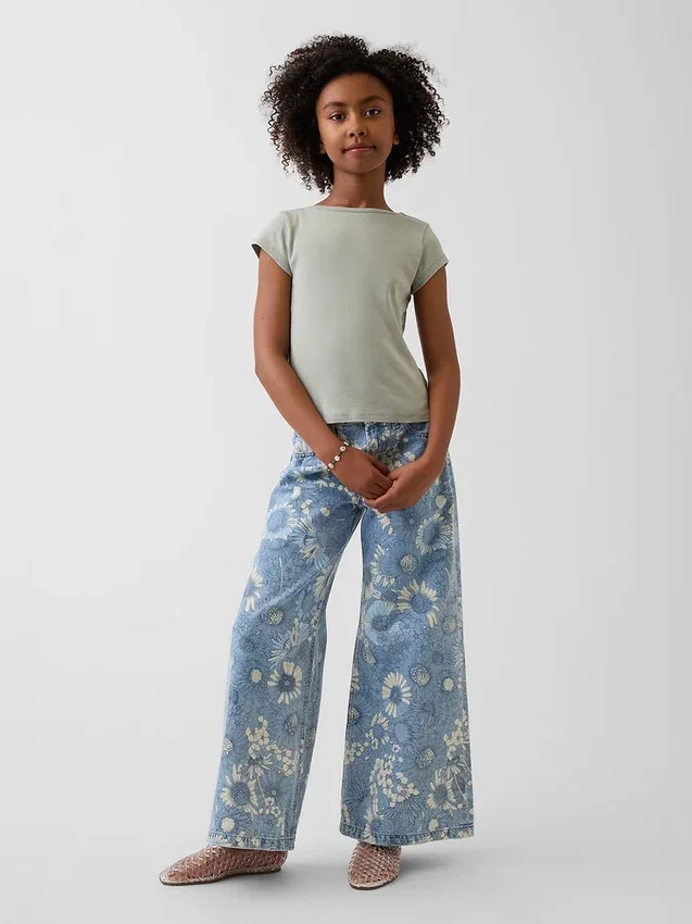 Jeans baggy a vita bassa con motivo floreale per bambini