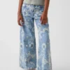 Jeans baggy a vita bassa con motivo floreale per bambini