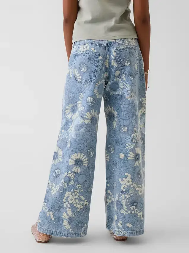 Jeans baggy a vita bassa con motivo floreale per bambini