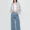 Jeans baggy a vita media in denim ultra morbido a righe