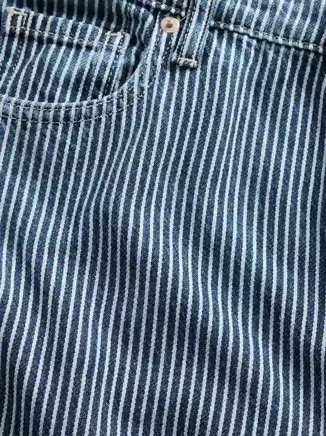 Jeans baggy a vita media in denim ultra morbido a righe