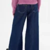 Jeans baggy da bambino a vita bassa con effetto metallizzato