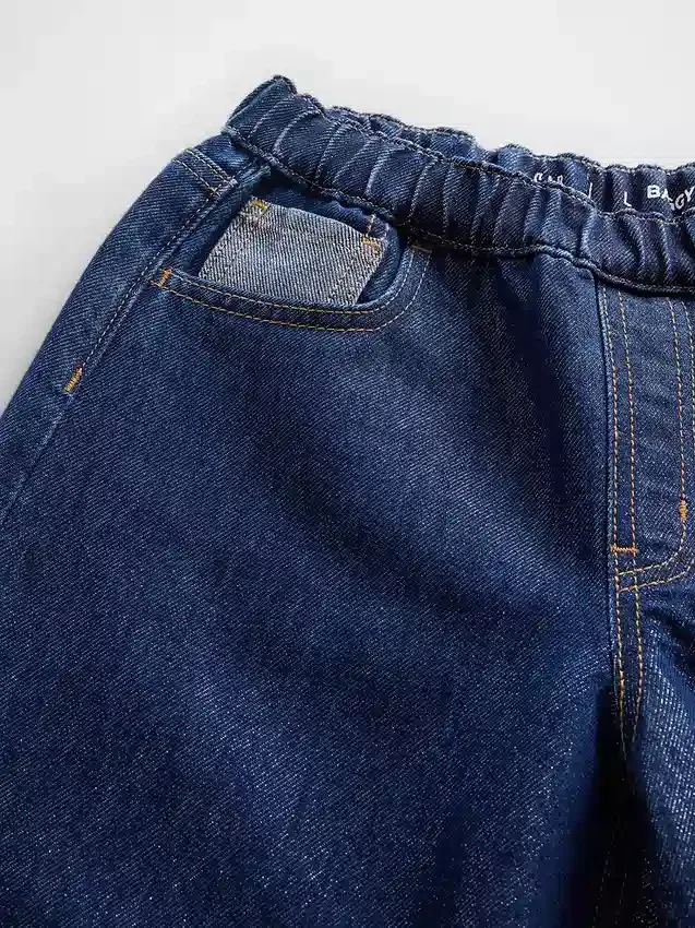 Jeans baggy da bambino a vita bassa con effetto metallizzato