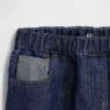 Jeans baggy da bambino a vita bassa con effetto metallizzato