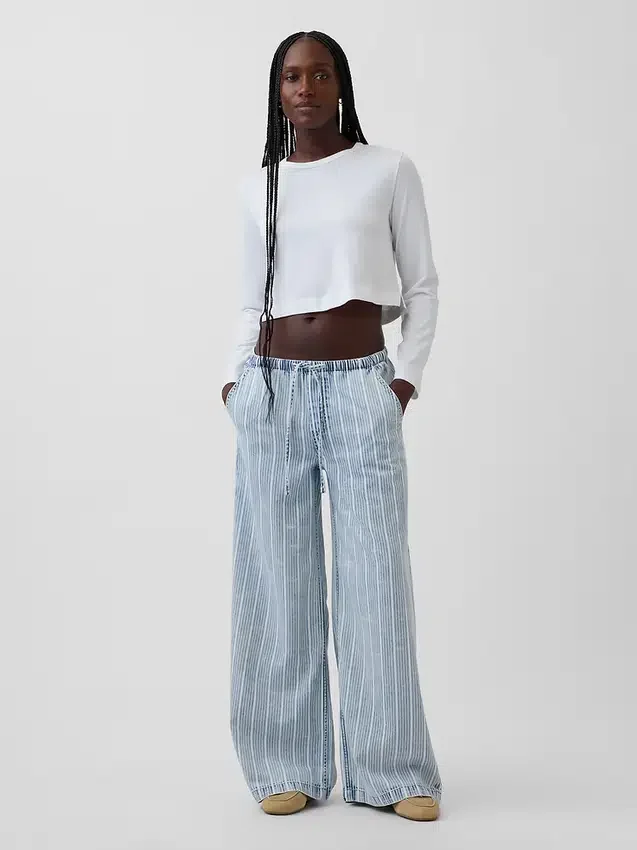 Jeans baggy morbidi a vita media