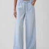 Jeans baggy morbidi a vita media