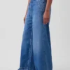 Jeans baggy morbidi a vita media