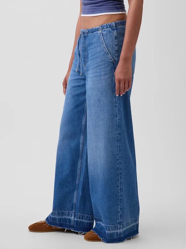 Jeans baggy morbidi a vita media