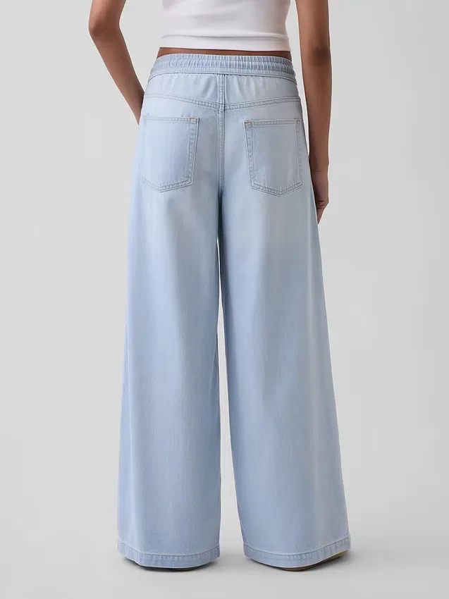 Jeans baggy morbidi a vita media