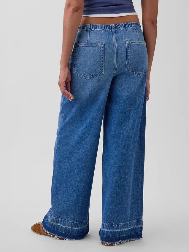 Jeans baggy morbidi a vita media