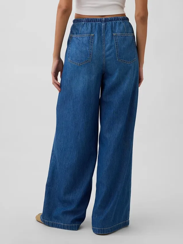 Jeans baggy morbidi a vita media
