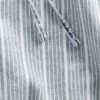 Jeans baggy morbidi a vita media